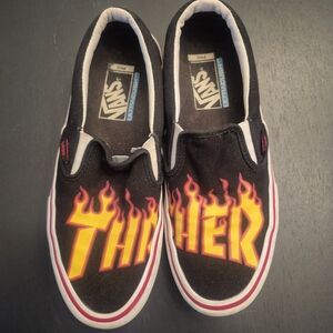 Vans Slip-On Sneakers with Yellow and Red Flame Thrasher Graphic